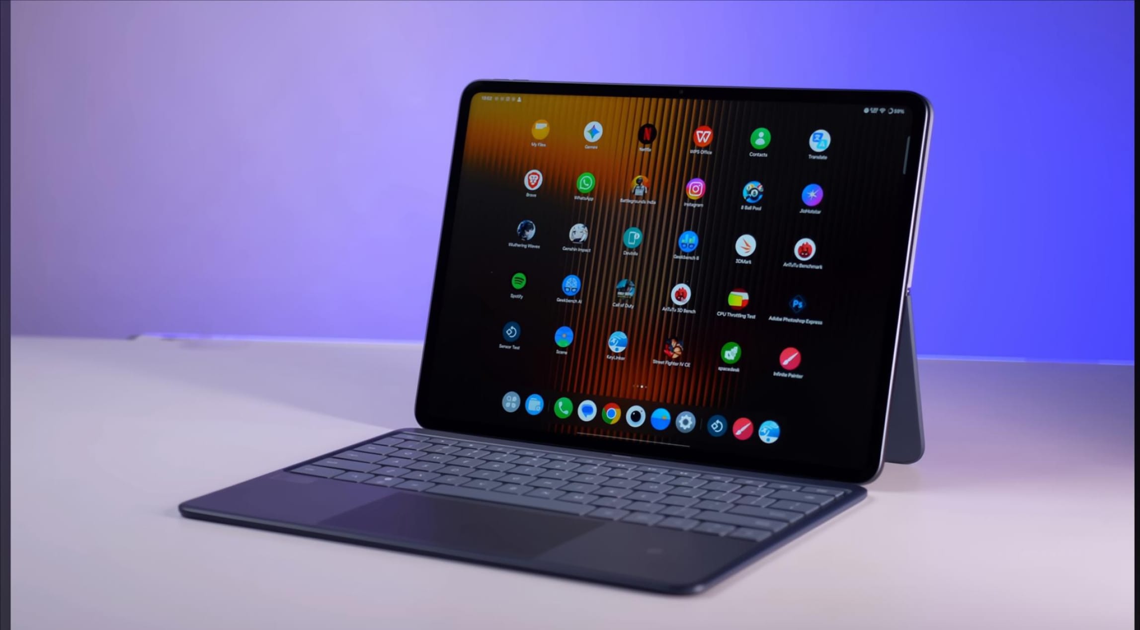 OnePlus Pad 3 with keyboard attached, displaying home screen and apps.