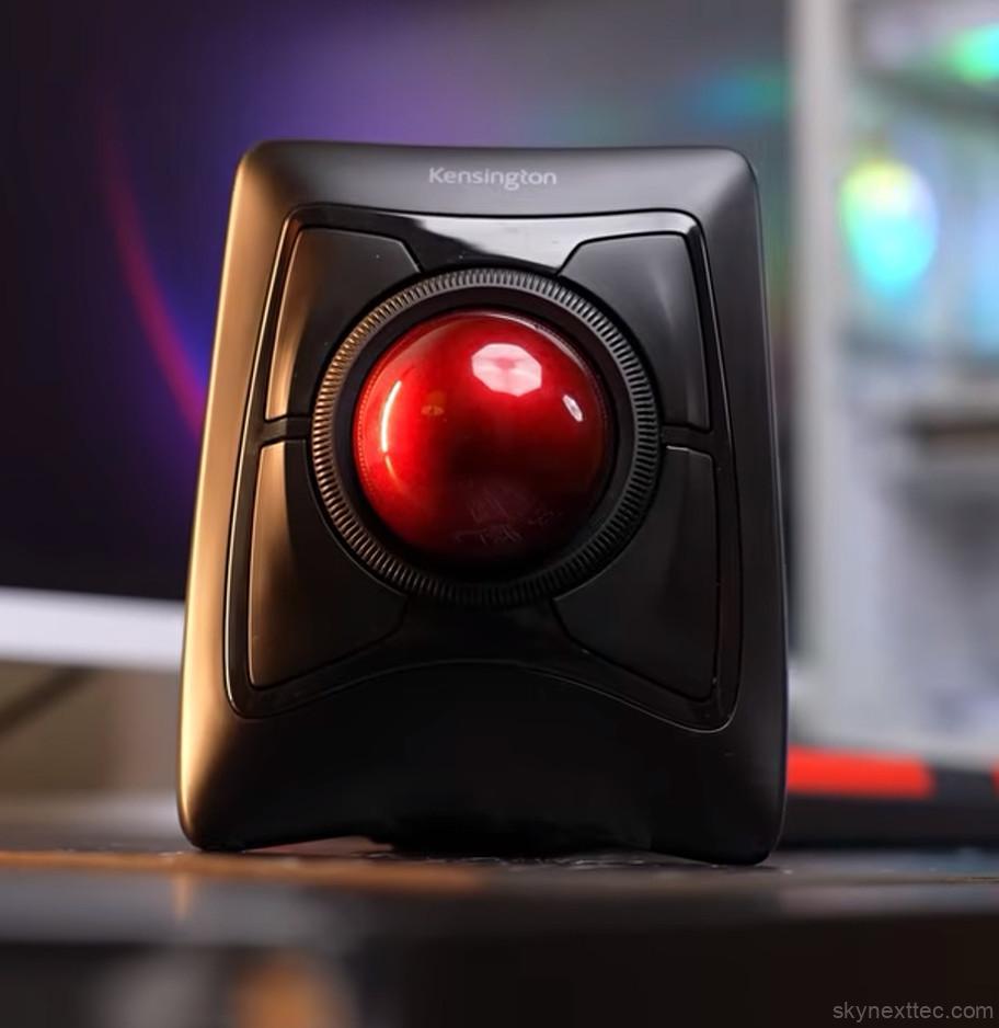 Kensington Expert Mouse wireless trackball with large red trackball on office desk